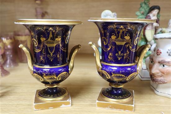 A small group of ceramics, including a pair of Derby style cobalt blue campana urns